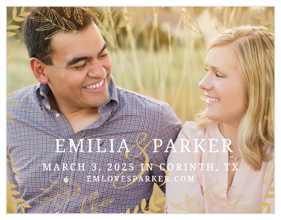 Delicate leaves frame your picture on the Secret Garden Foil Save-the-Date Cards.